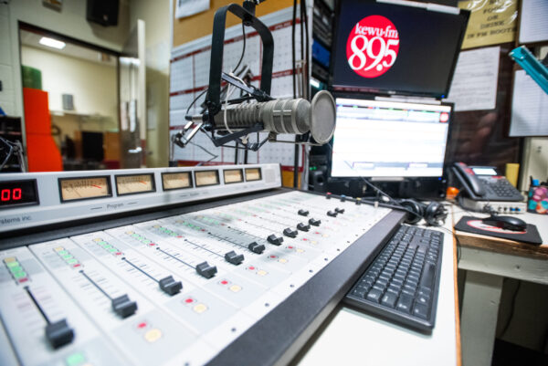 Photo of control board and microphone inside the KEWU broadcast room.