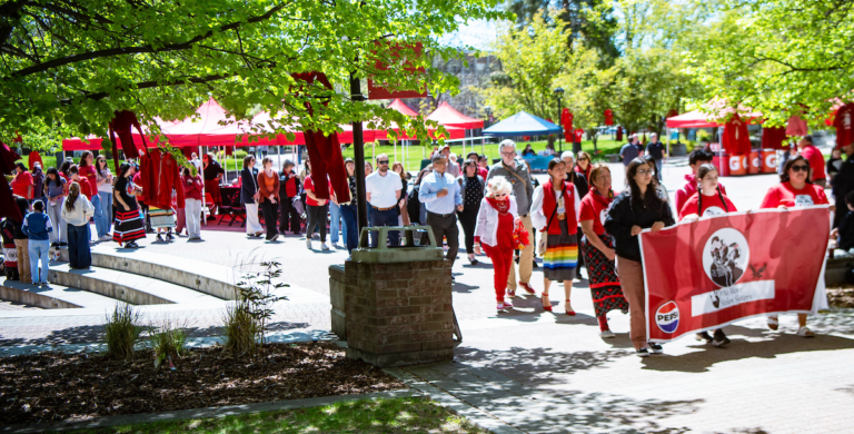 Photo of line of people marching to honor the National Day of Awareness for MMIW/P.
