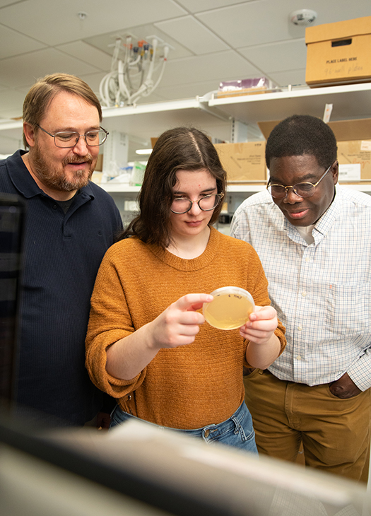 EWU biochemists with senior student researcher.