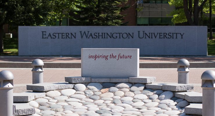 Campus mall, stone says EWU Inspiring the future.